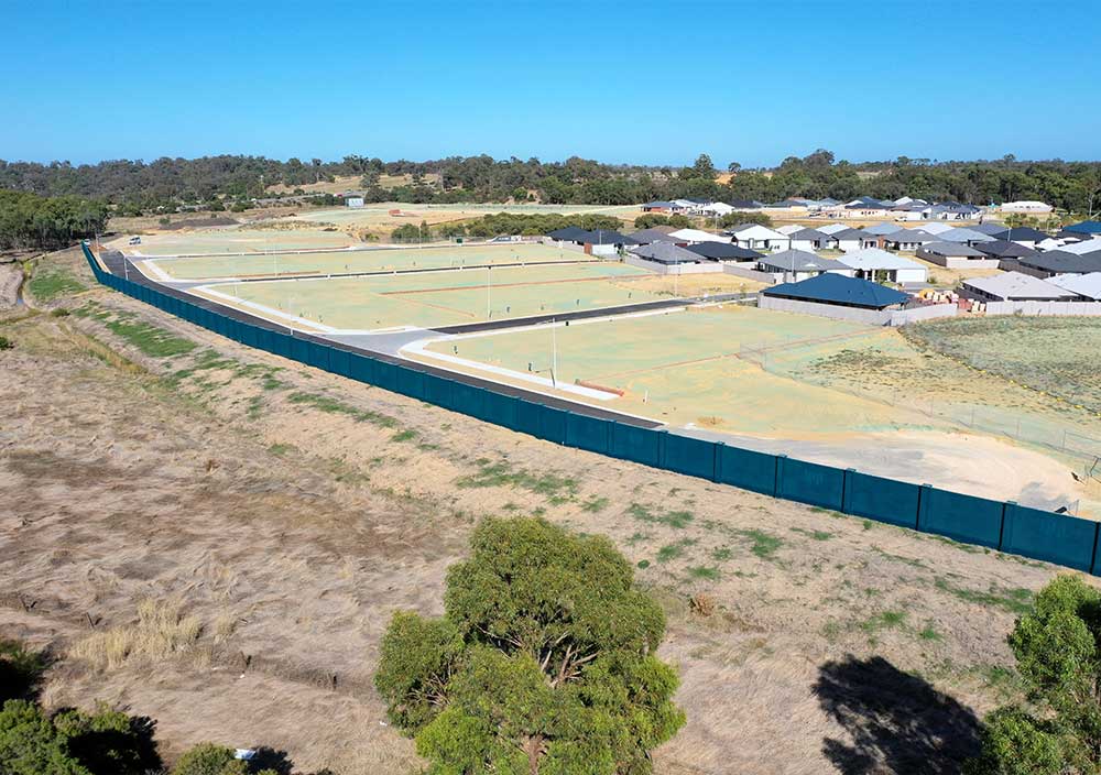 A precast concrete retaining wall system installed by Smartstream Technology