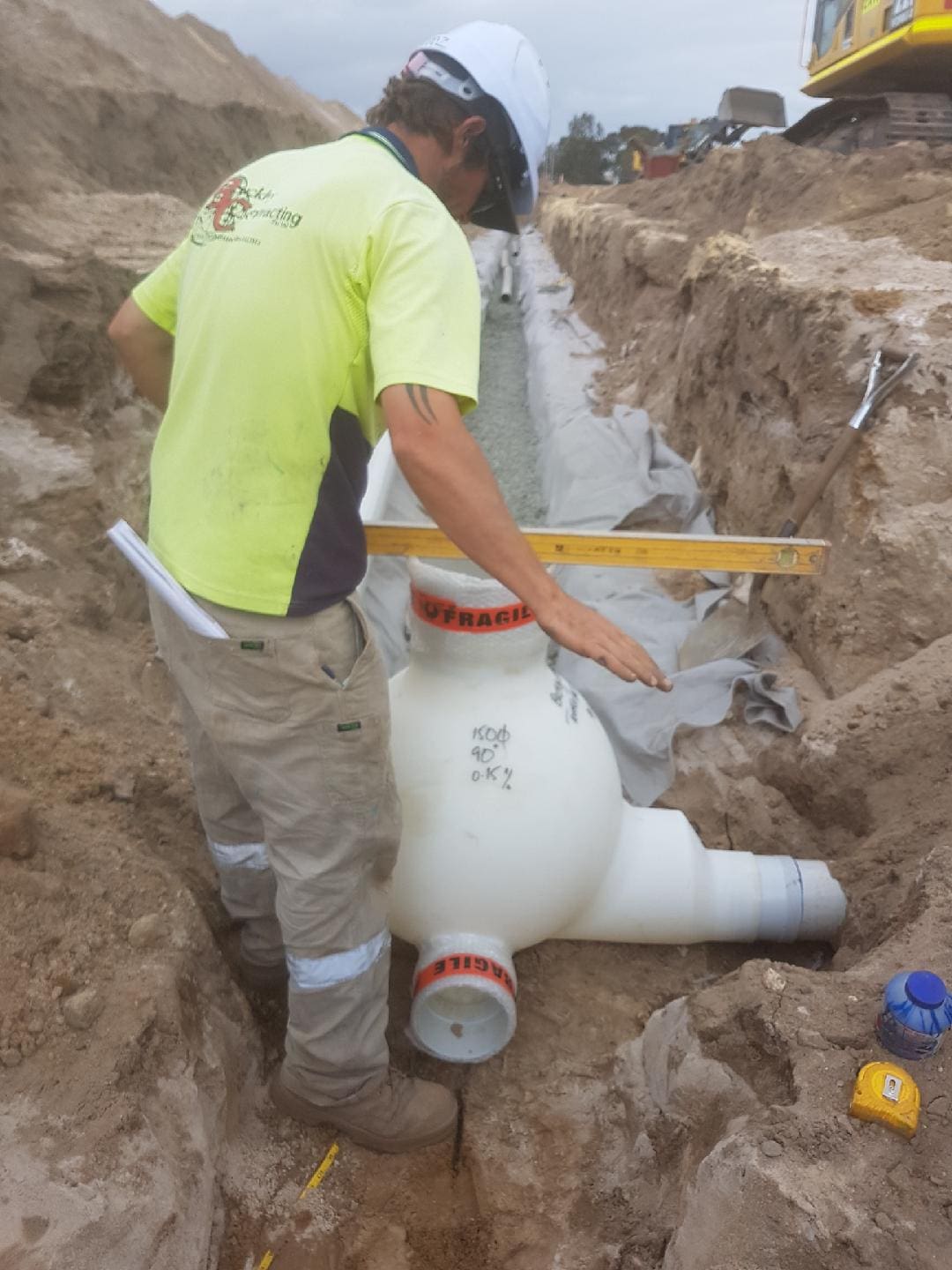An engineer installing Poo Pit shaft for Sewerage management
